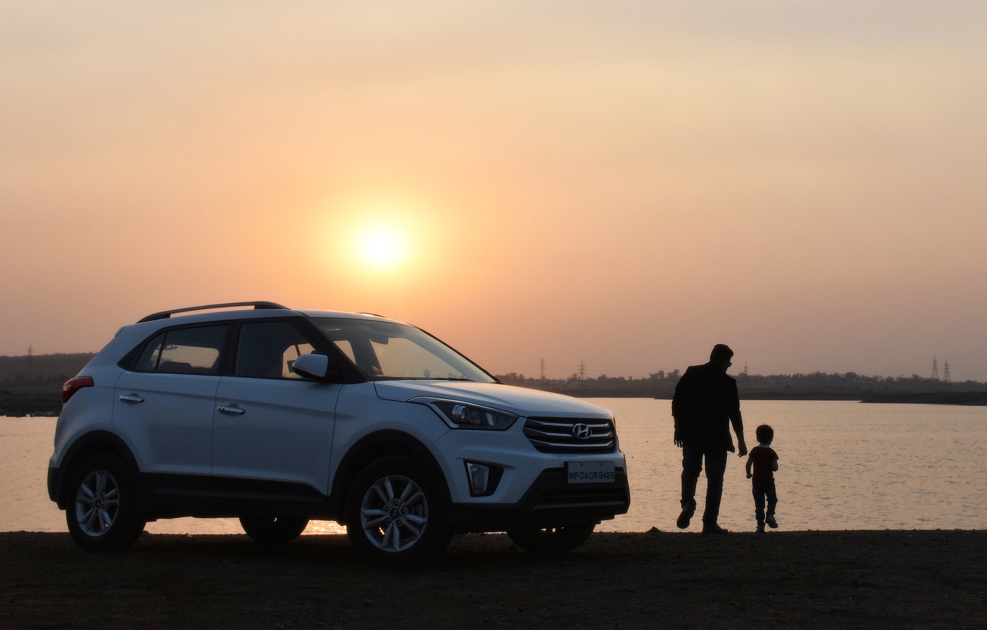 Family car with dad and son